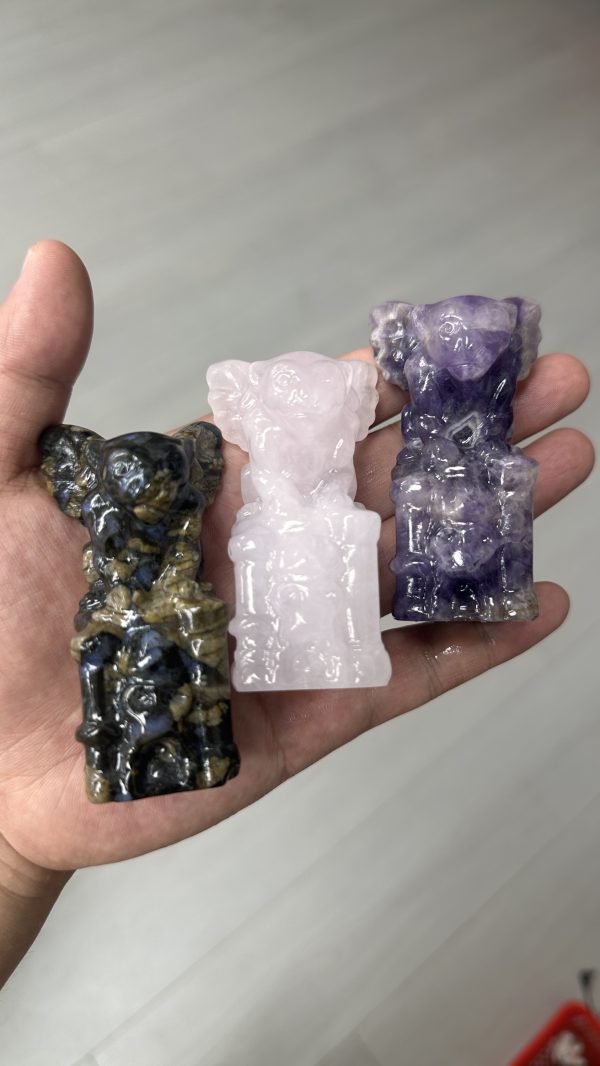 Gargoyles carved from various natural crystals