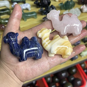 Camels carved from various natural crystals