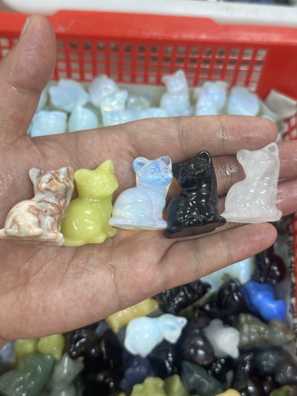 Cute little cat carved from mixed crystals