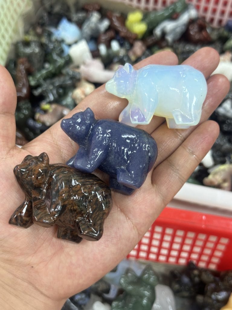 Bear carved from mixed materials crystal