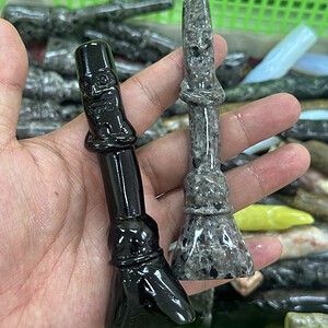 Flying broom carved from mixed materials with crystal inlay