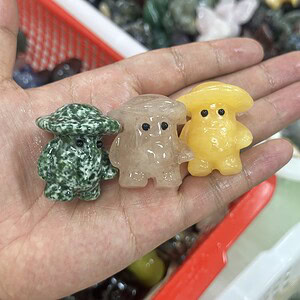Mushroom man carved from mixed materials crystal