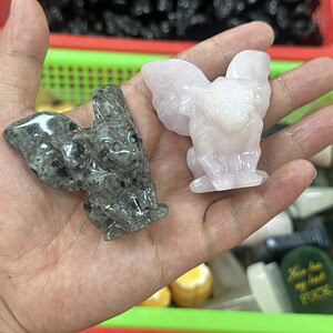 Gargoyle carved from mixed materials and crystal